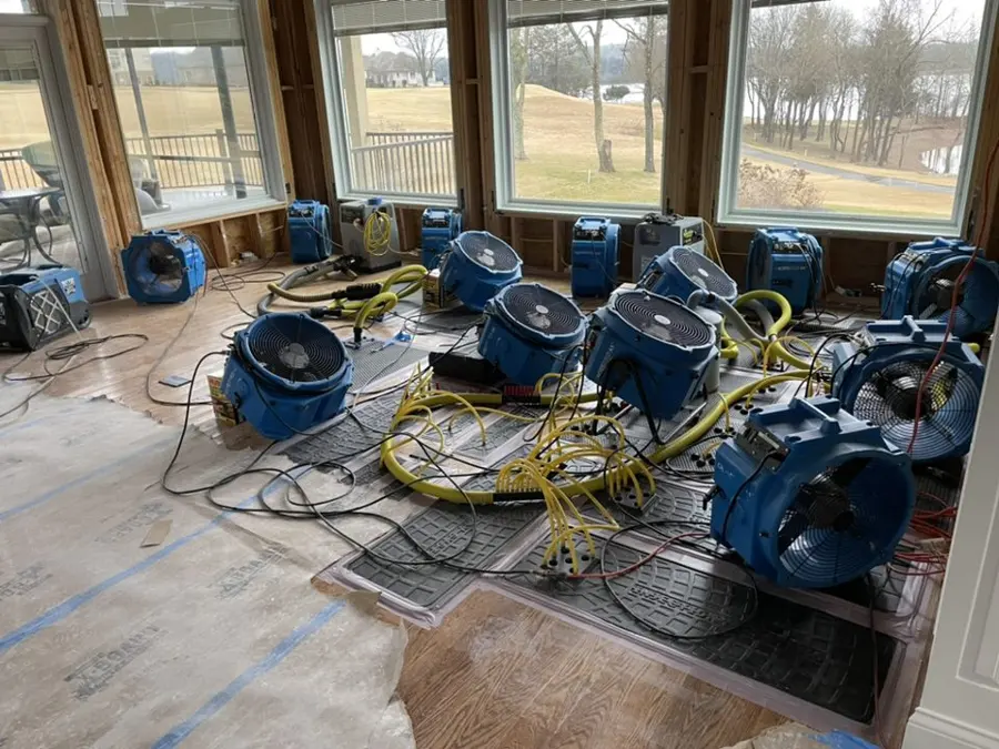 Air movers drying a flooded Big Lake, MN commercial space